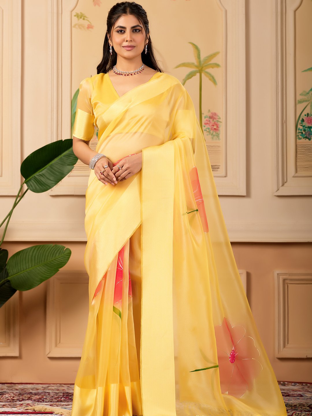 Yellow Organza Saree With Unstitched Blouse Piece.