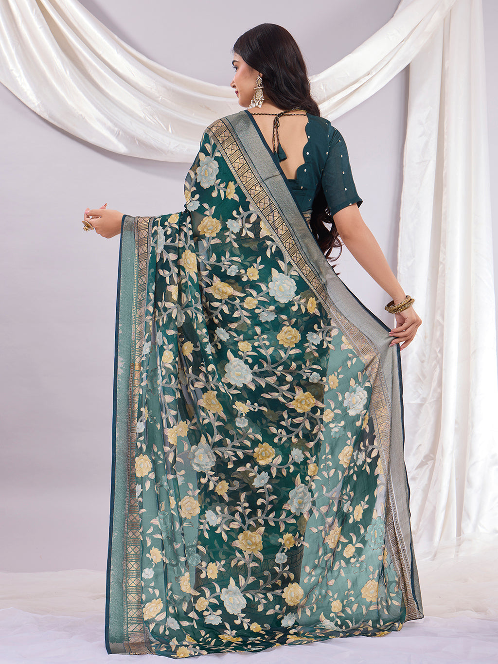 Premium Soft Brasso Saree With Fancy Blouse Piece.