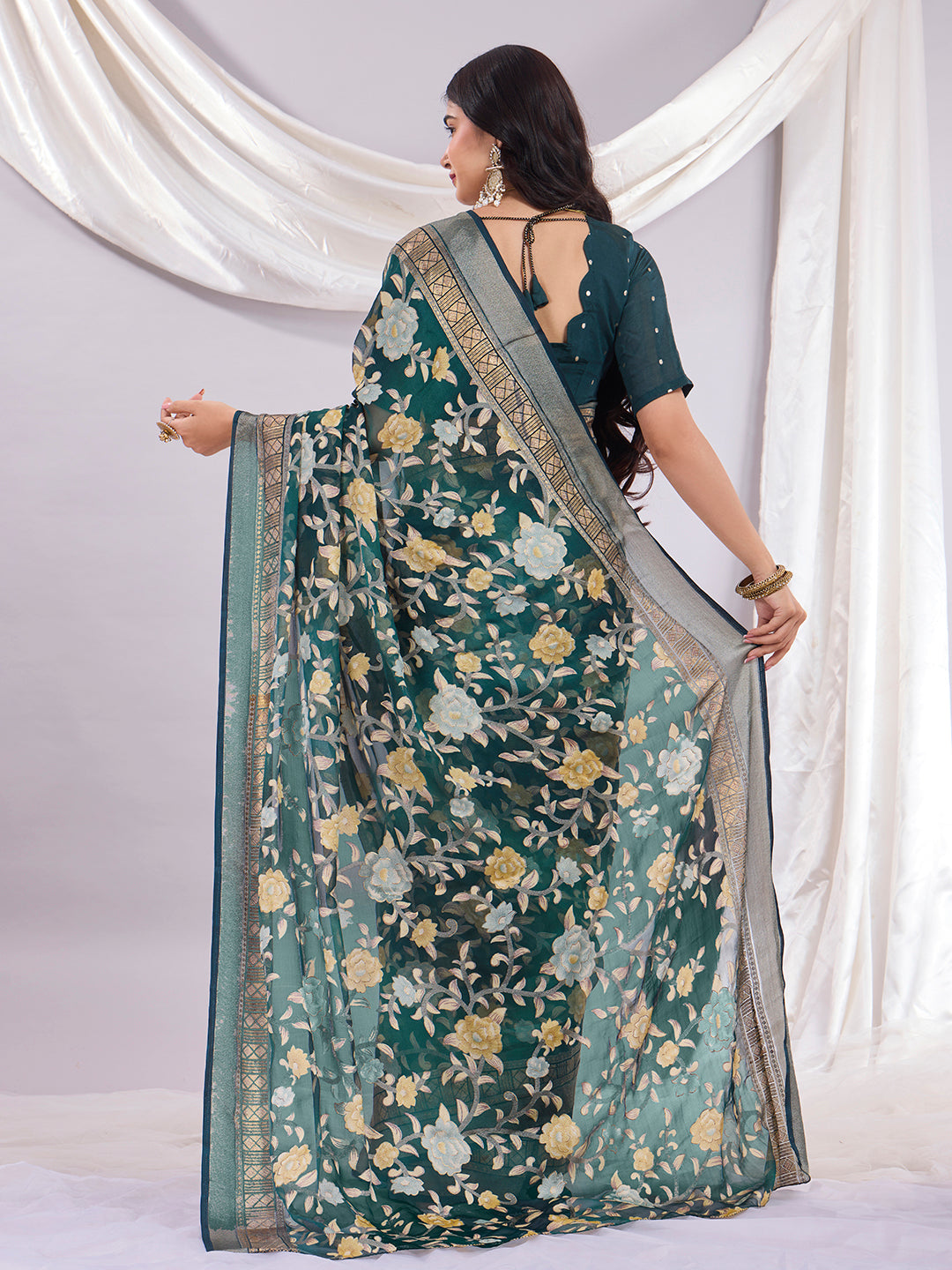 Premium Soft Brasso Saree With Fancy Blouse Piece.