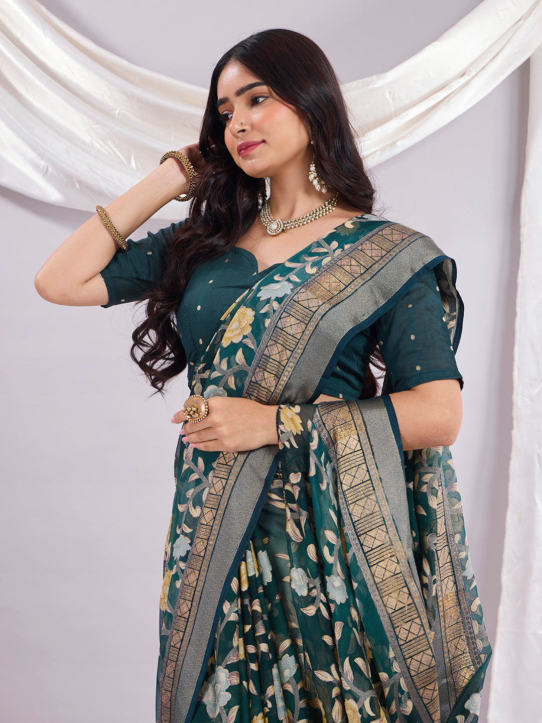 Premium Soft Brasso Saree With Fancy Blouse Piece.
