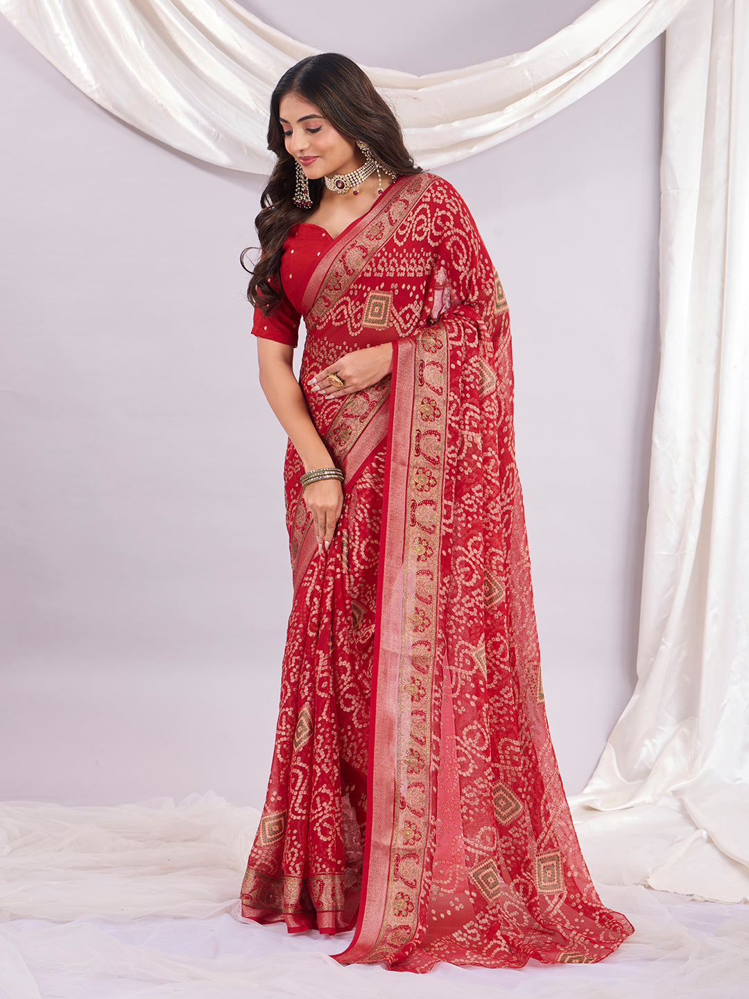 Premium Bandhani Brasso Saree With Fancy Unstitched Blouse Piece.