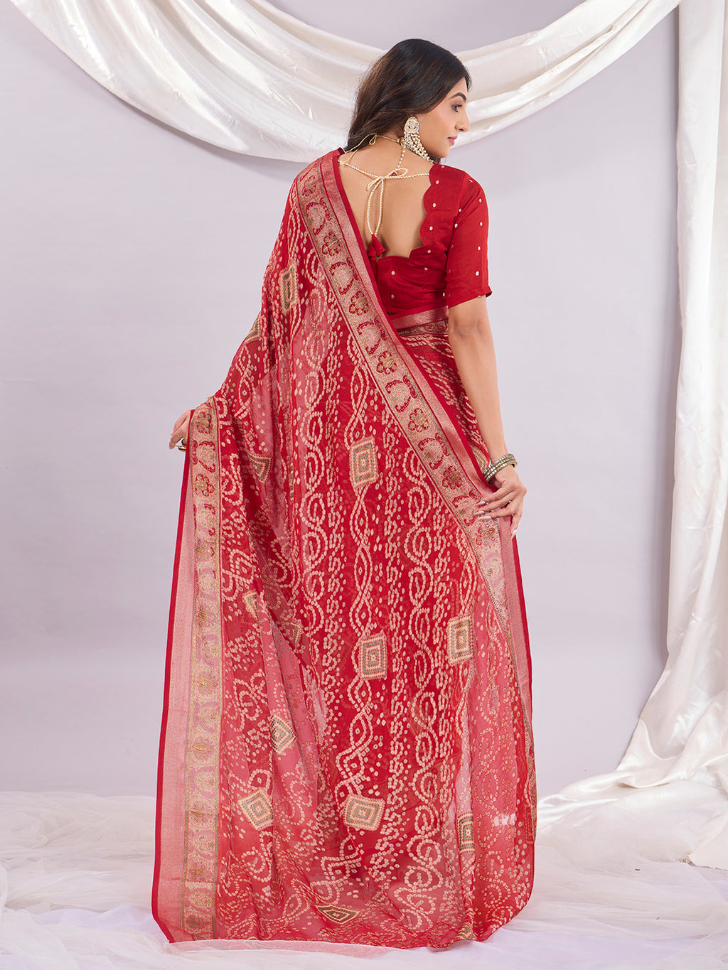 Premium Bandhani Brasso Saree With Fancy Unstitched Blouse Piece.
