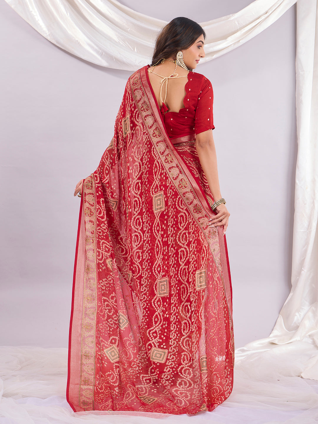 Premium Bandhani Brasso Saree With Fancy Unstitched Blouse Piece.