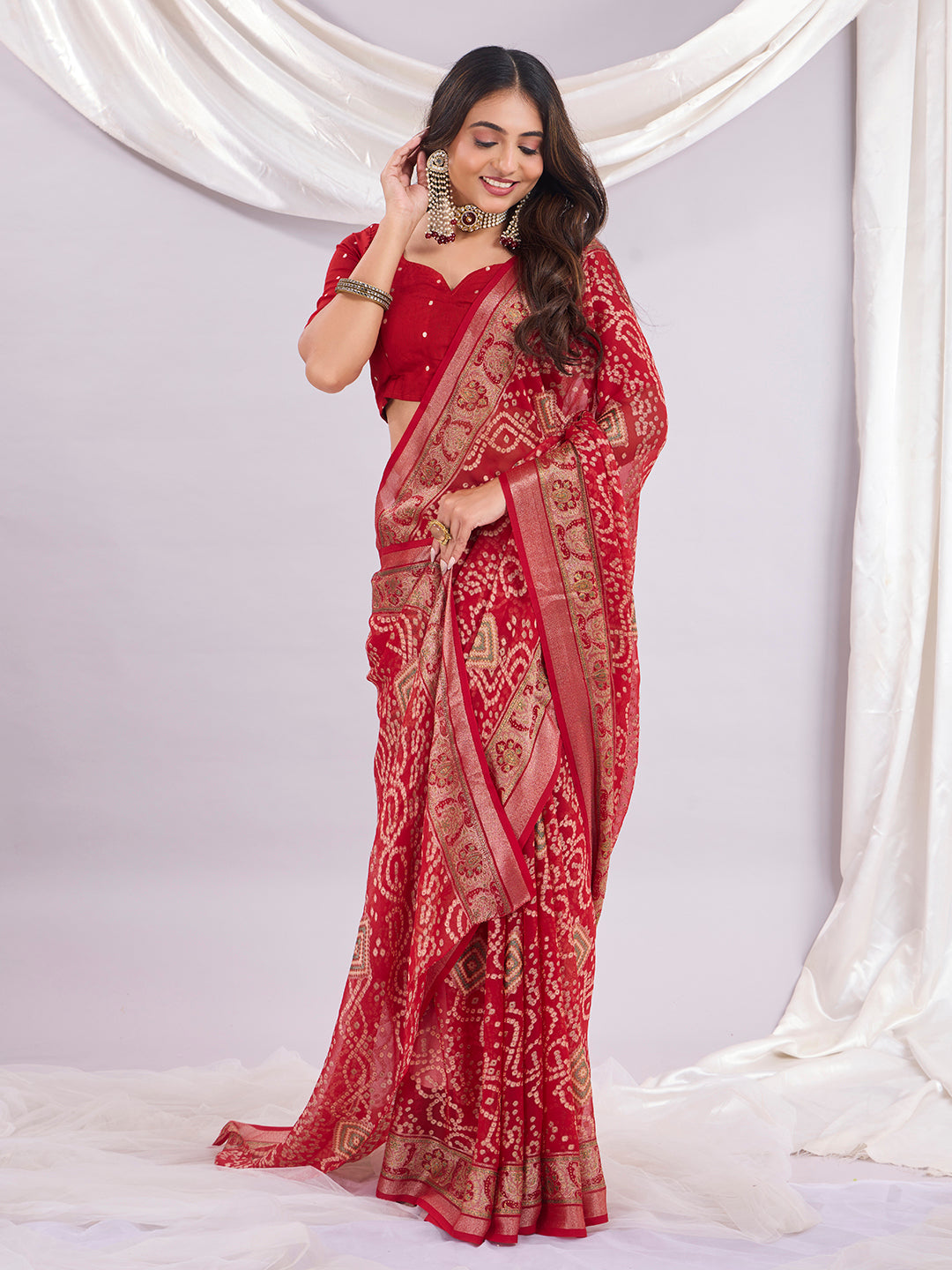 Premium Bandhani Brasso Saree With Fancy Unstitched Blouse Piece.