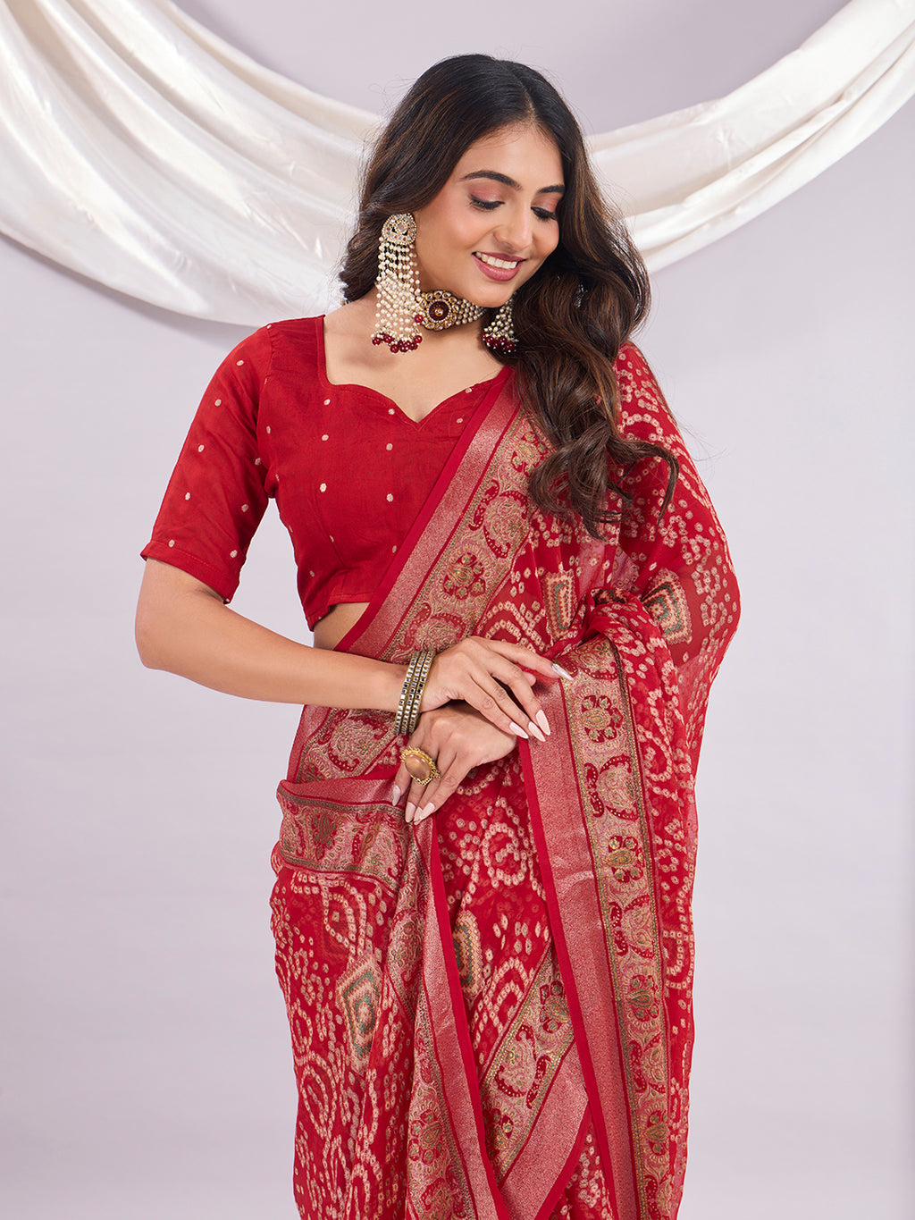 Premium Bandhani Brasso Saree With Fancy Unstitched Blouse Piece.