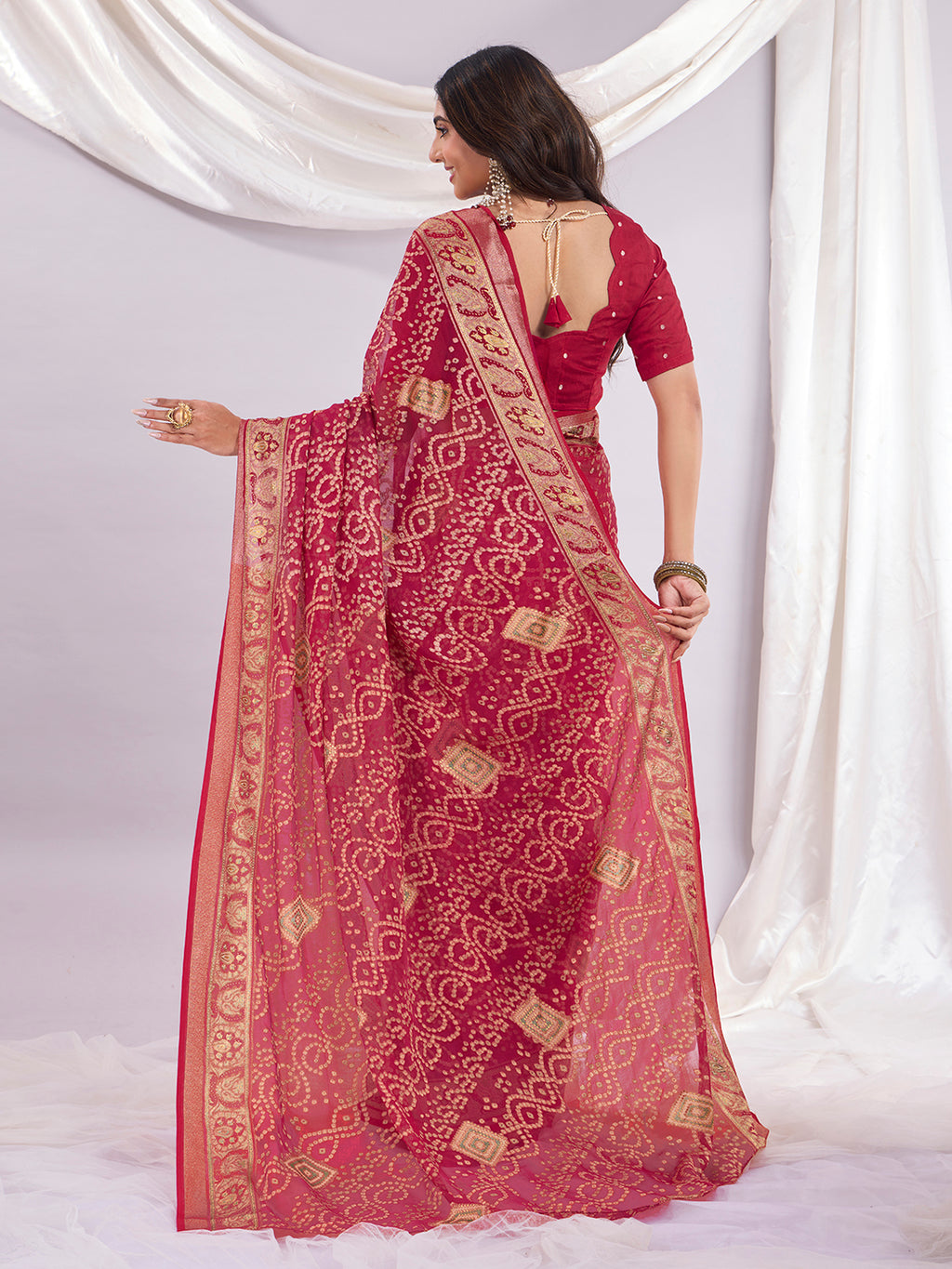 Premium Bandhani Brasso Saree With Fancy Unstitched Blouse Piece.