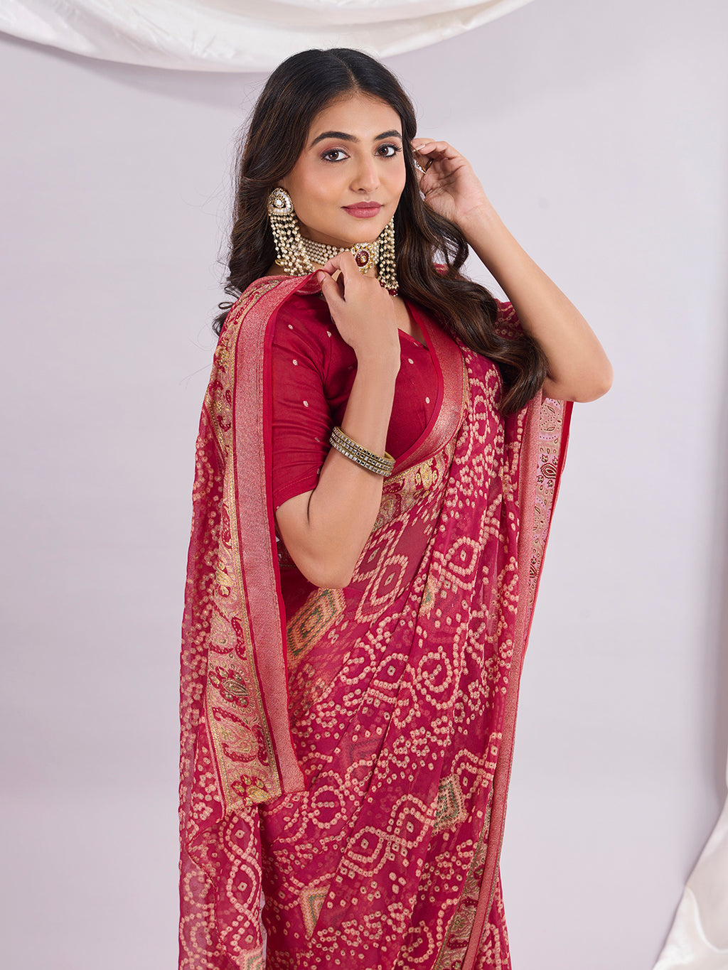 Premium Bandhani Brasso Saree With Fancy Unstitched Blouse Piece.