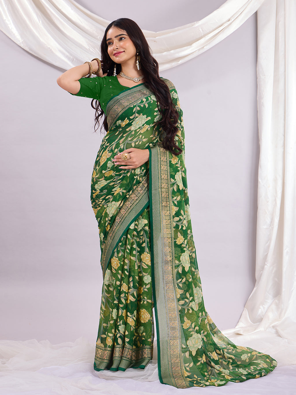 Premium Soft Brasso Saree With Fancy Blouse Piece.