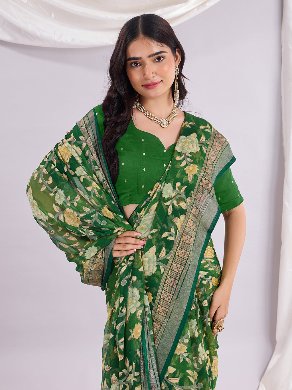 Premium Soft Brasso Saree With Fancy Blouse Piece.