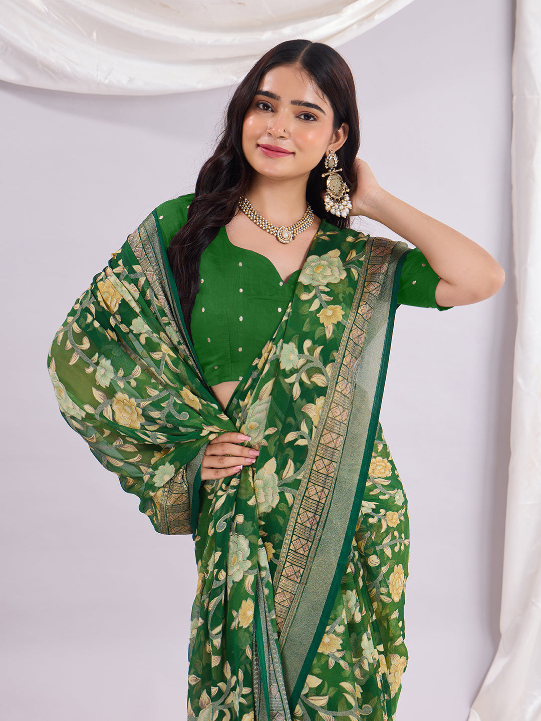 Premium Soft Brasso Saree With Fancy Blouse Piece.