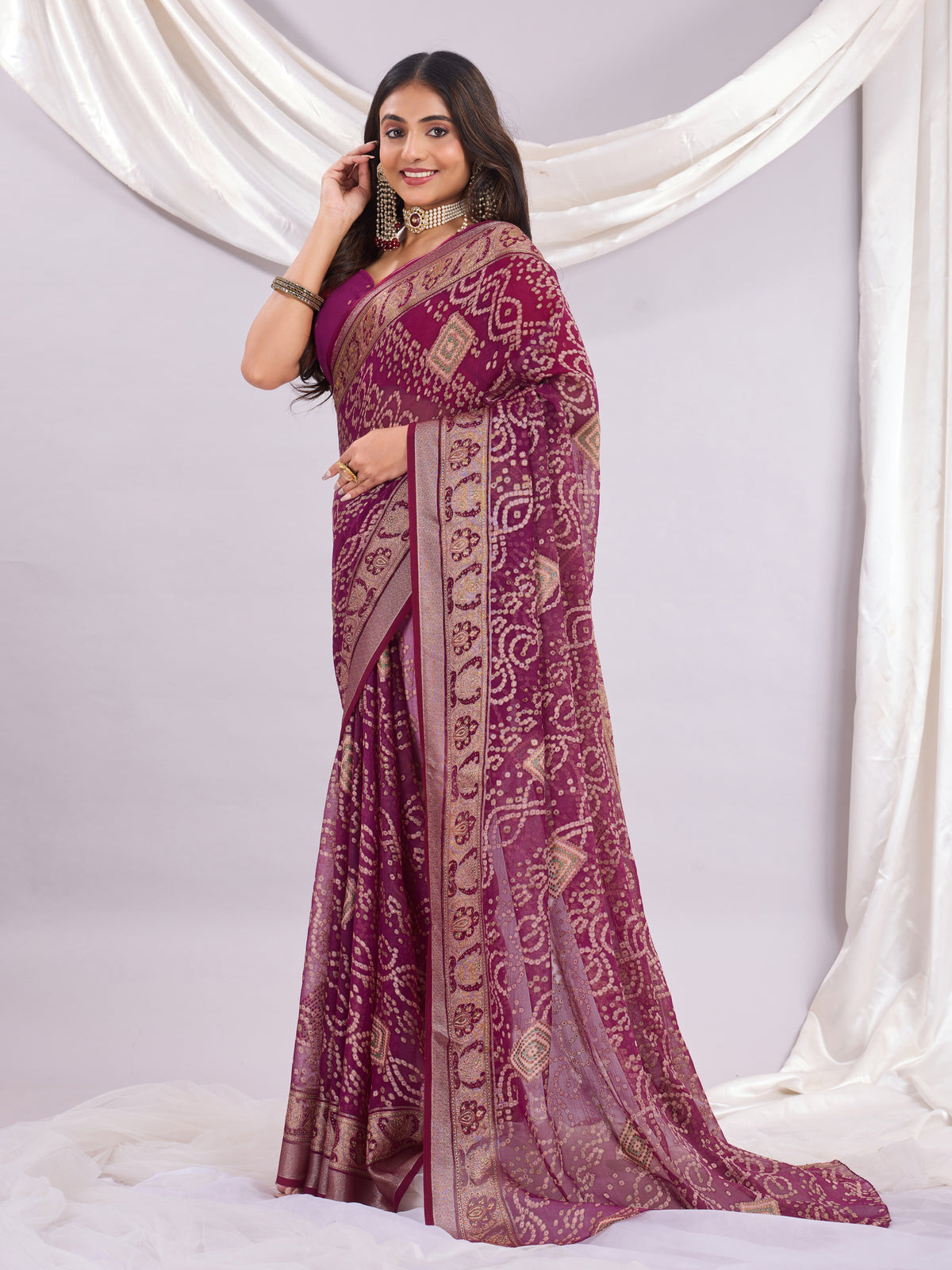 Premium Bandhani Brasso Saree With Fancy Unstitched Blouse Piece.