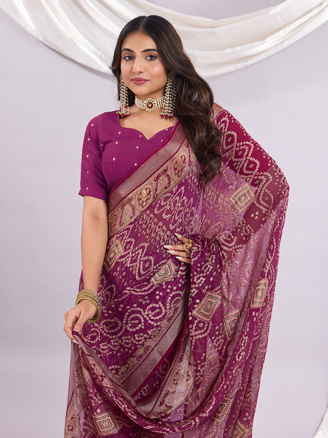 Premium Bandhani Brasso Saree With Fancy Unstitched Blouse Piece.