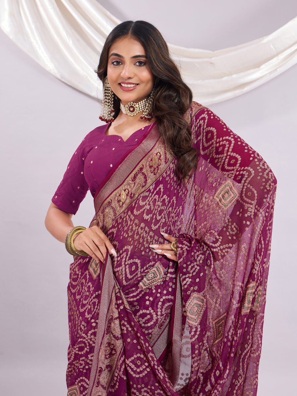 Premium Bandhani Brasso Saree With Fancy Unstitched Blouse Piece.