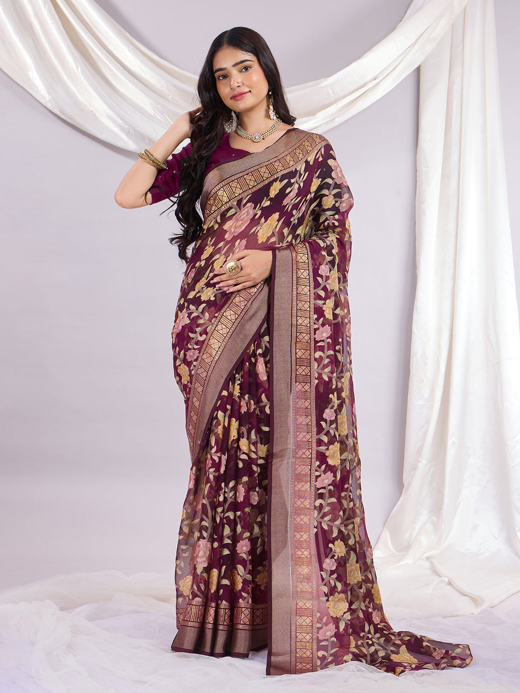 Premium Soft Brasso Saree With Fancy Blouse Piece.