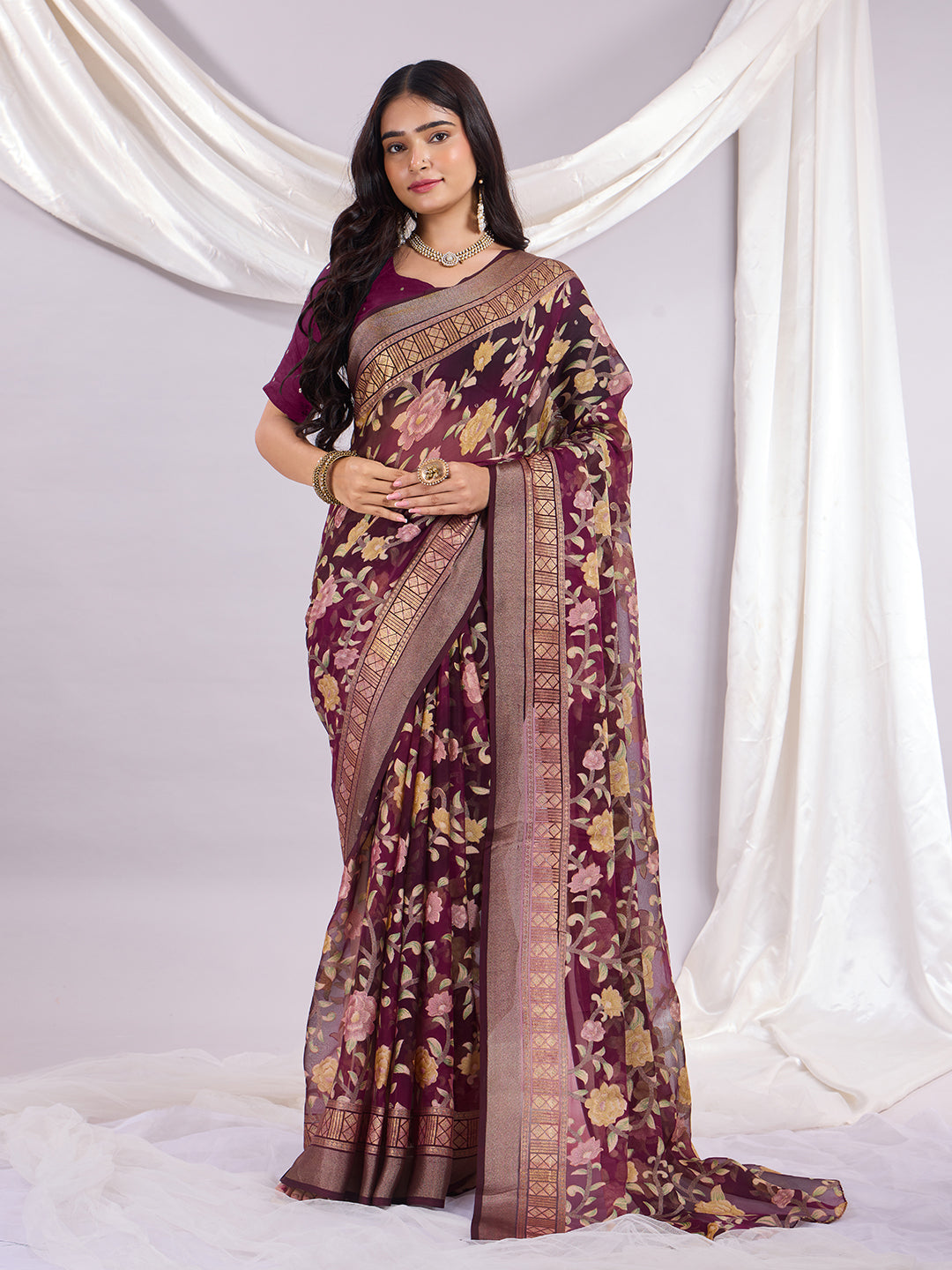 Premium Soft Brasso Saree With Fancy Blouse Piece.