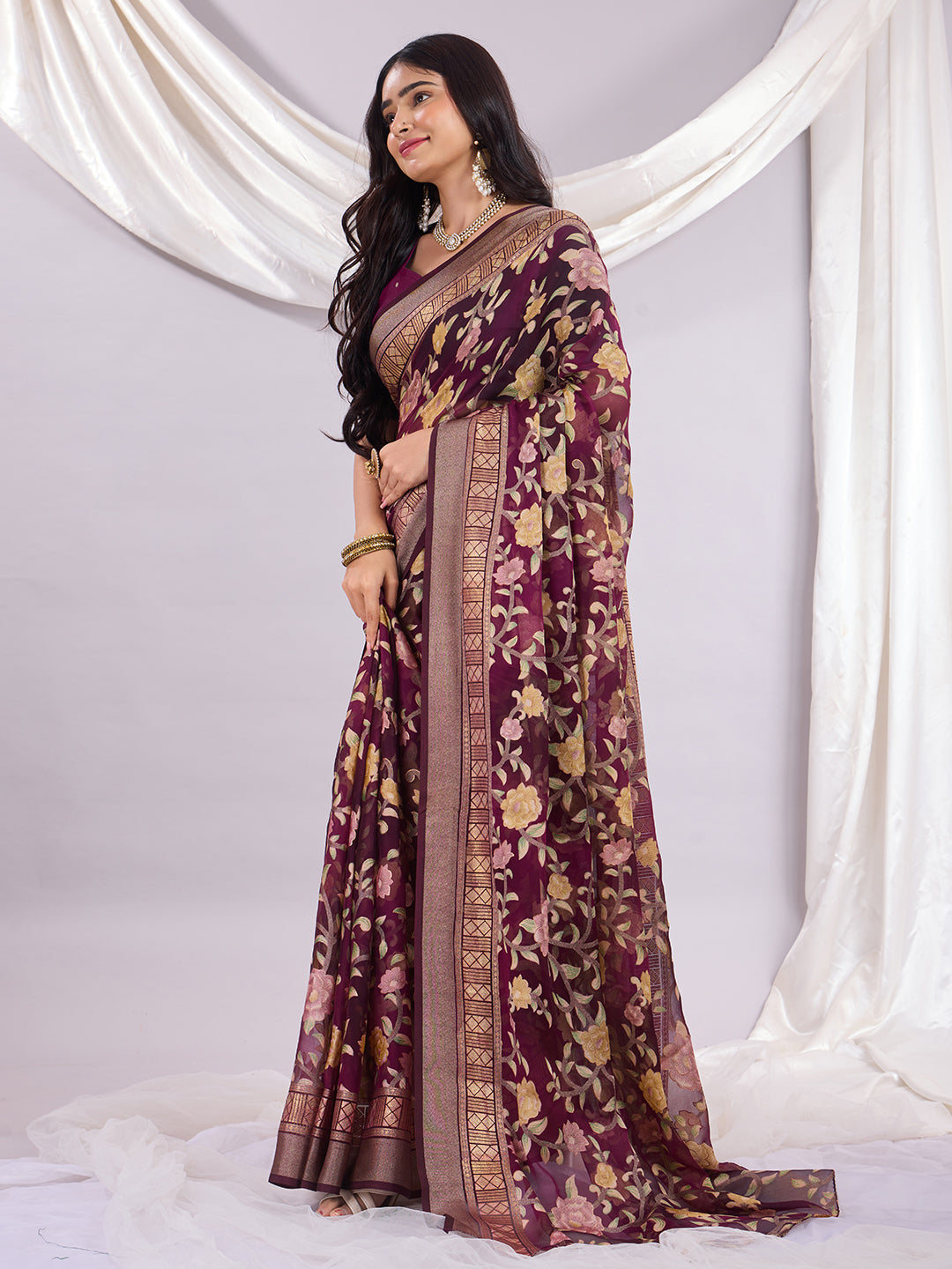 Premium Soft Brasso Saree With Fancy Blouse Piece.