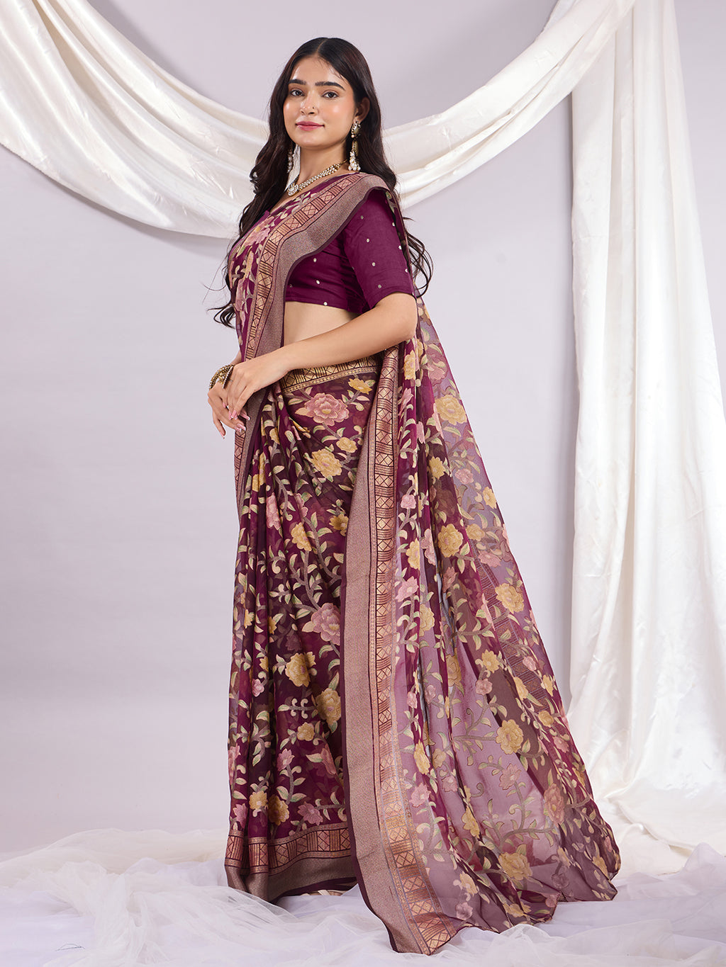 Premium Soft Brasso Saree With Fancy Blouse Piece.