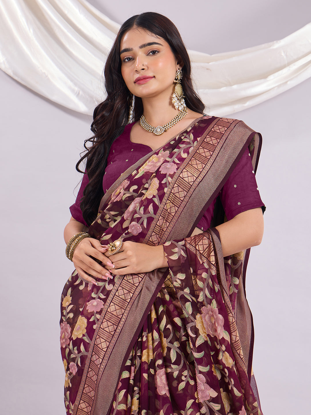 Premium Soft Brasso Saree With Fancy Blouse Piece.