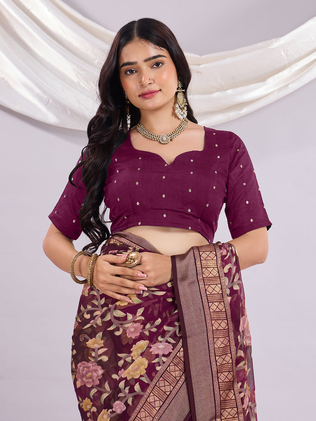 Premium Soft Brasso Saree With Fancy Blouse Piece.