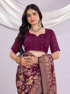 Premium Soft Brasso Saree With Fancy Blouse Piece.