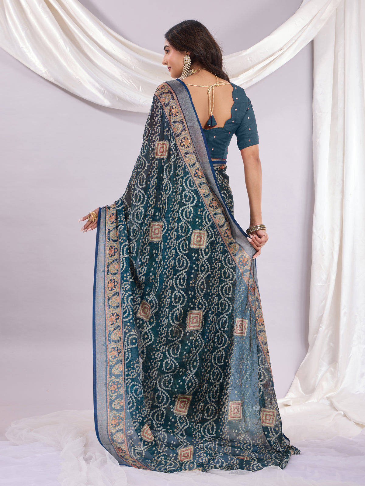 Premium Bandhani Brasso Saree With Fancy Unstitched Blouse Piece.