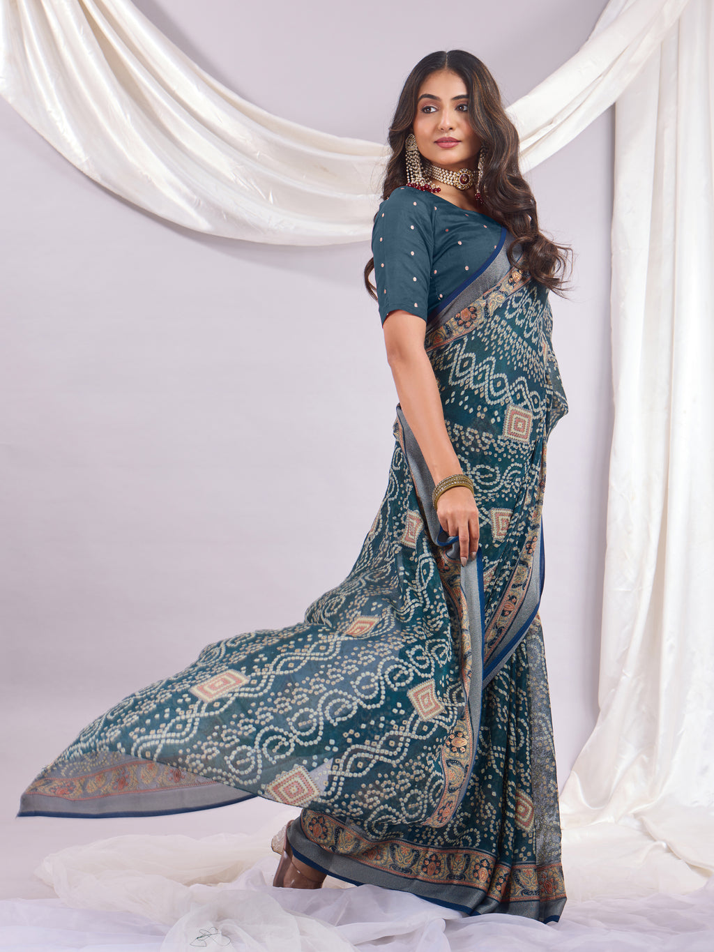 Premium Bandhani Brasso Saree With Fancy Unstitched Blouse Piece.