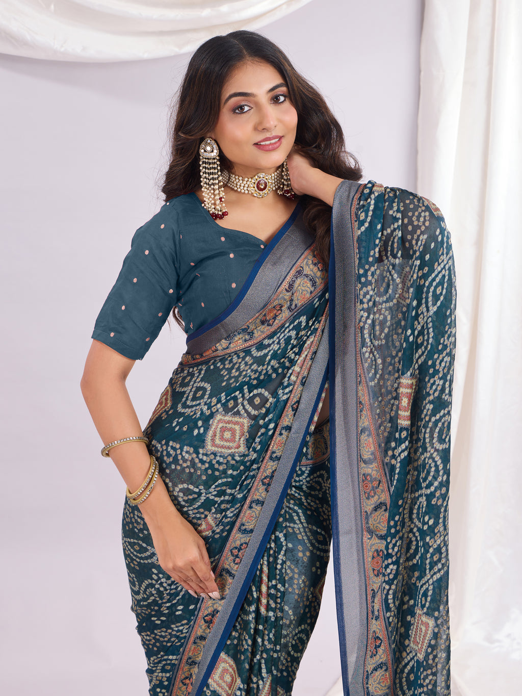 Premium Bandhani Brasso Saree With Fancy Unstitched Blouse Piece.