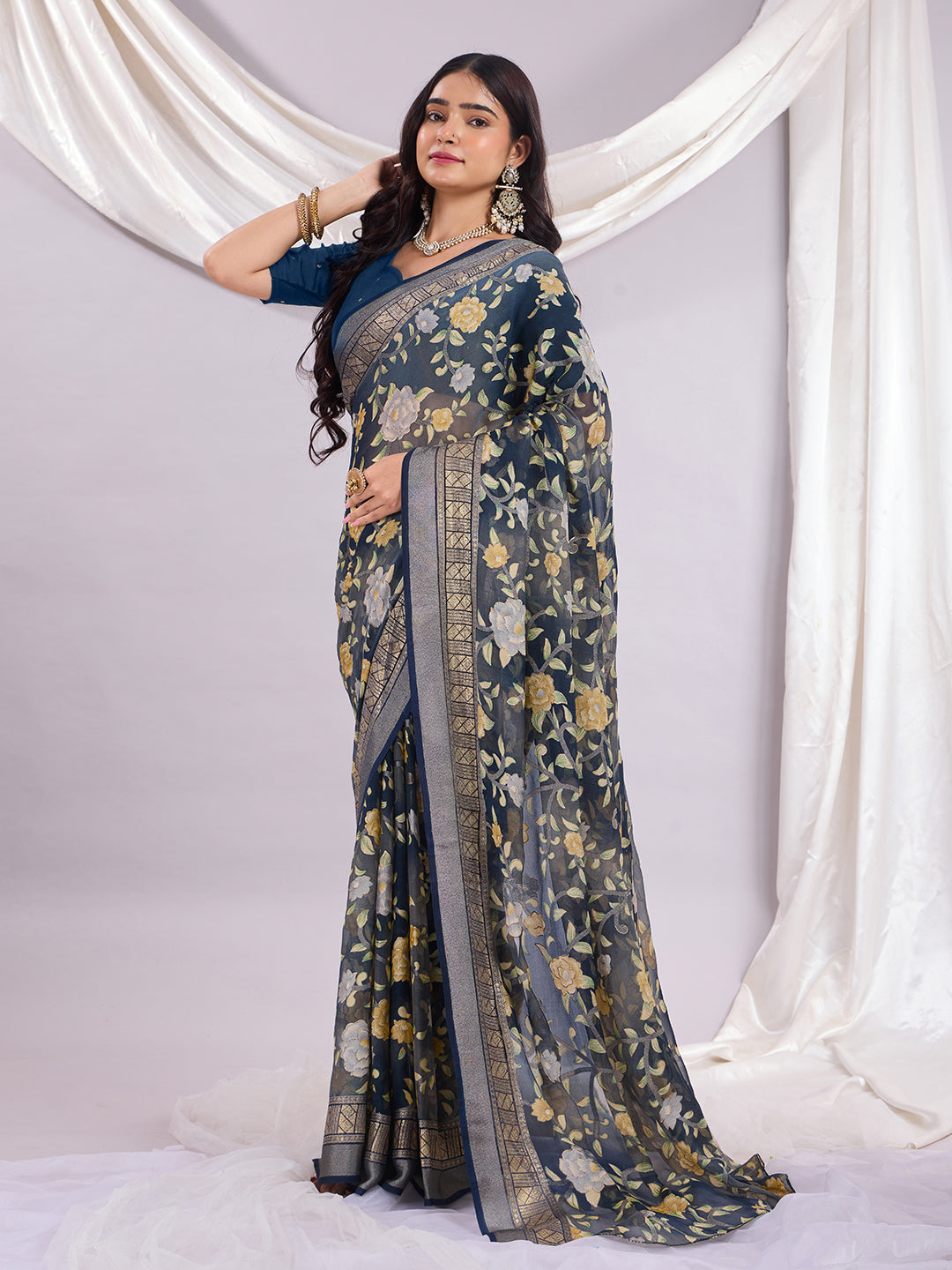 Premium Soft Brasso Saree With Fancy Blouse Piece.