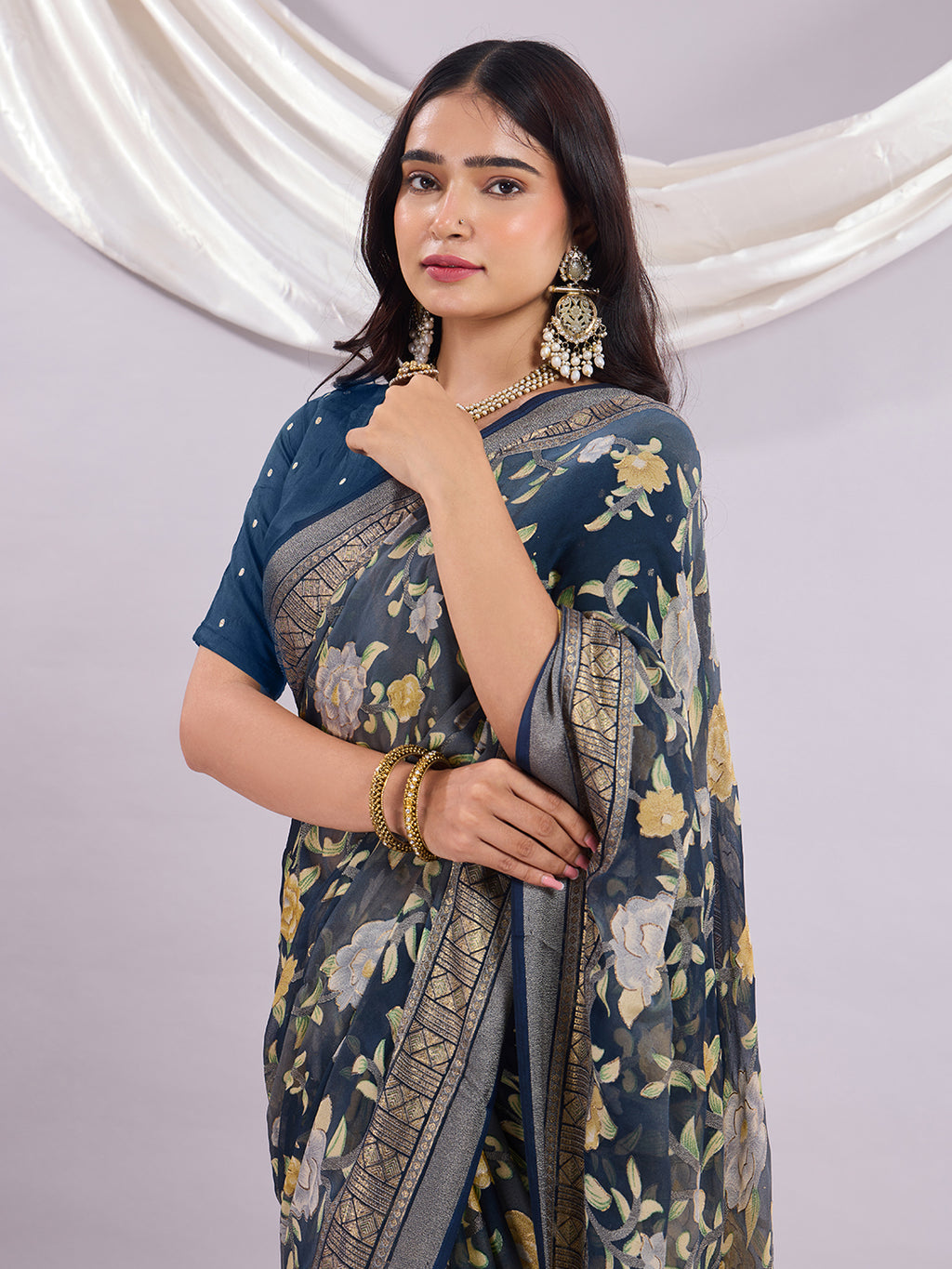 Premium Soft Brasso Saree With Fancy Blouse Piece.