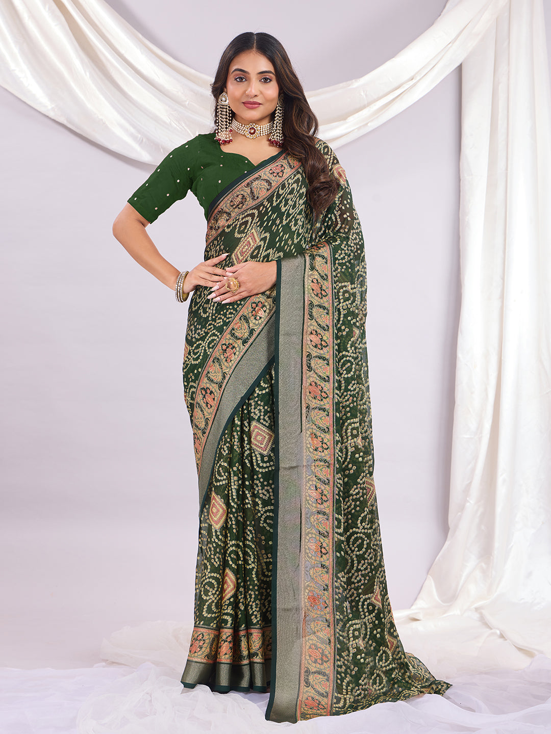 Premium Bandhani Brasso Saree With Fancy Unstitched Blouse Piece.