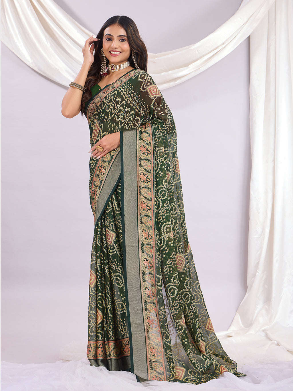 Premium Bandhani Brasso Saree With Fancy Unstitched Blouse Piece.