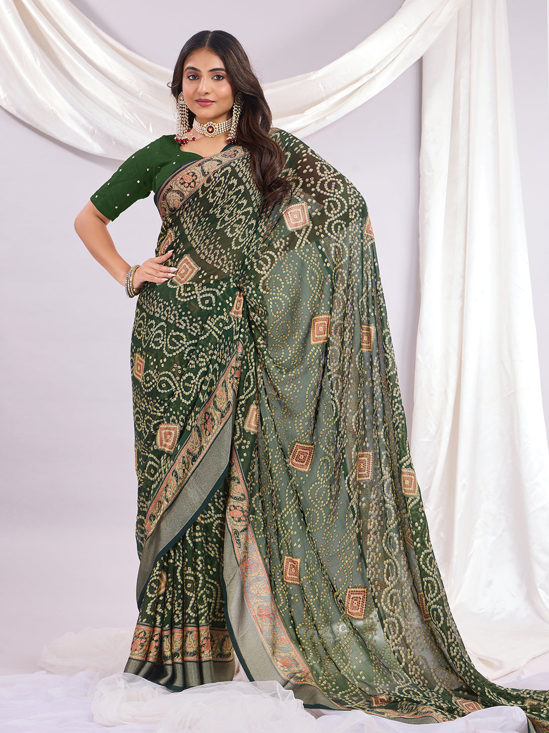 Premium Bandhani Brasso Saree With Fancy Unstitched Blouse Piece.