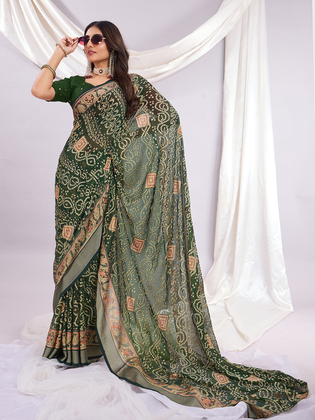 Premium Bandhani Brasso Saree With Fancy Unstitched Blouse Piece.