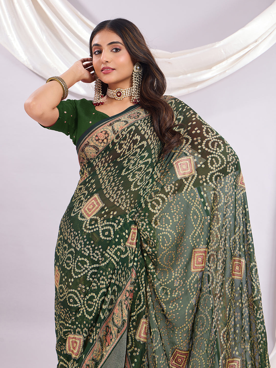 Premium Bandhani Brasso Saree With Fancy Unstitched Blouse Piece.