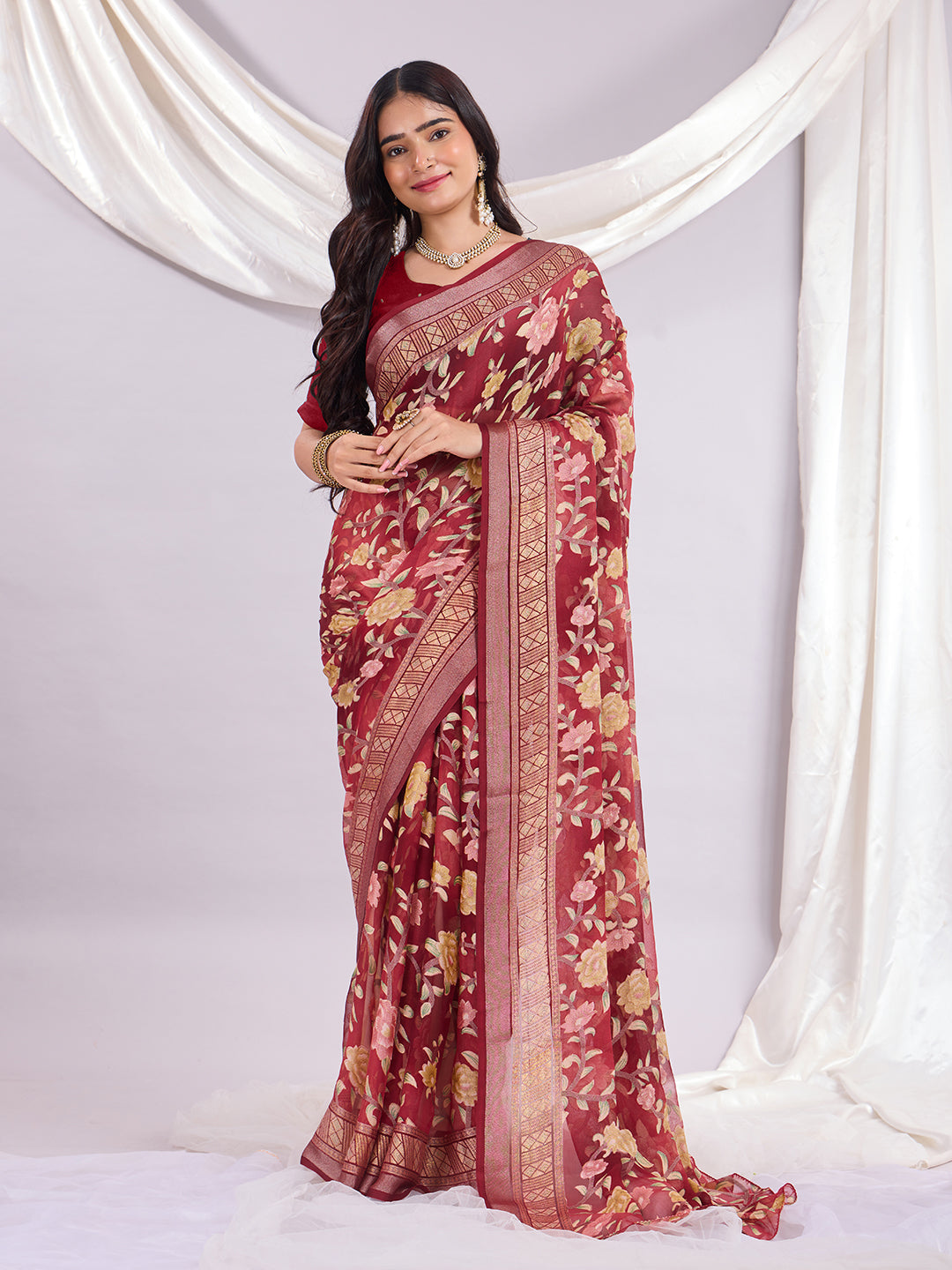 Premium Soft Brasso Saree With Fancy Blouse Piece.