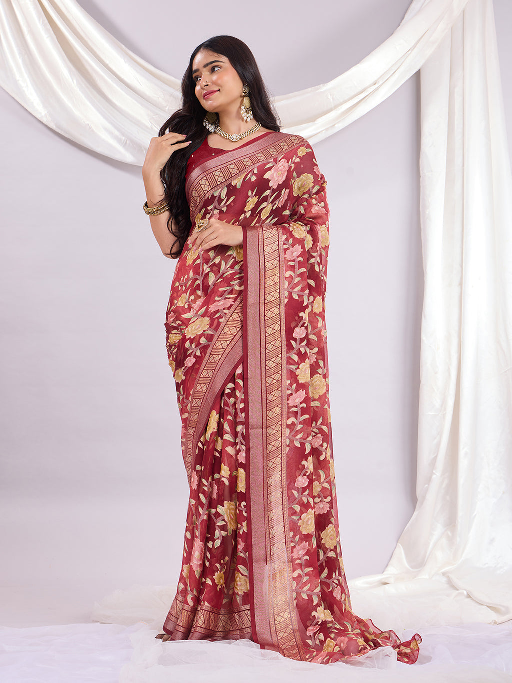 Premium Soft Brasso Saree With Fancy Blouse Piece.