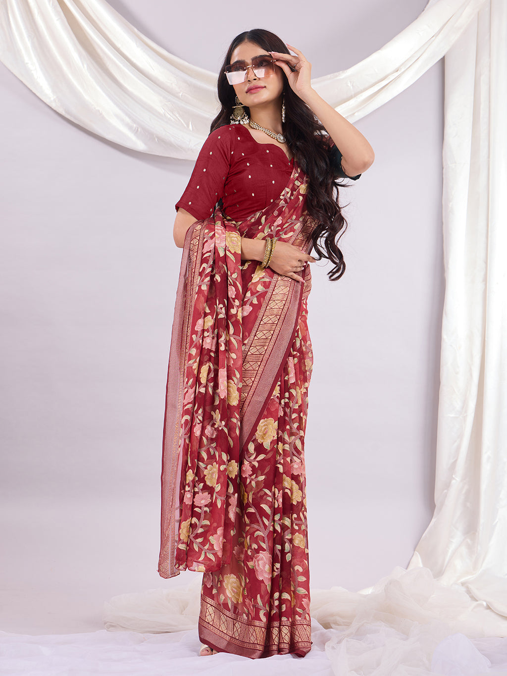 Premium Soft Brasso Saree With Fancy Blouse Piece.