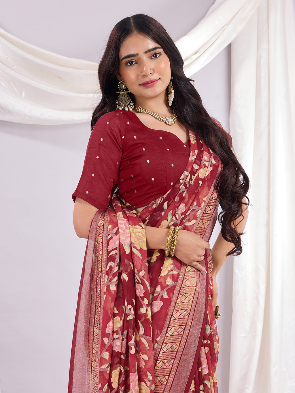 Premium Soft Brasso Saree With Fancy Blouse Piece.